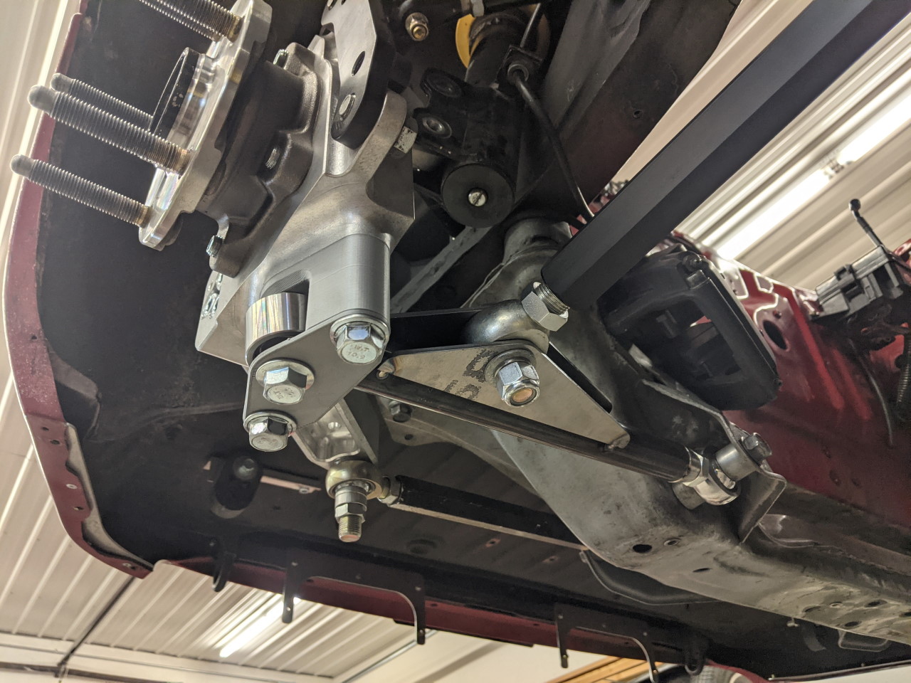 New double shear lower ball joint design