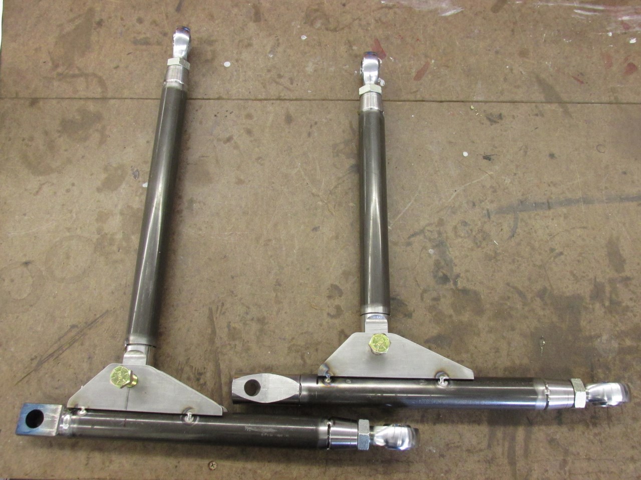 Tack welded control arms