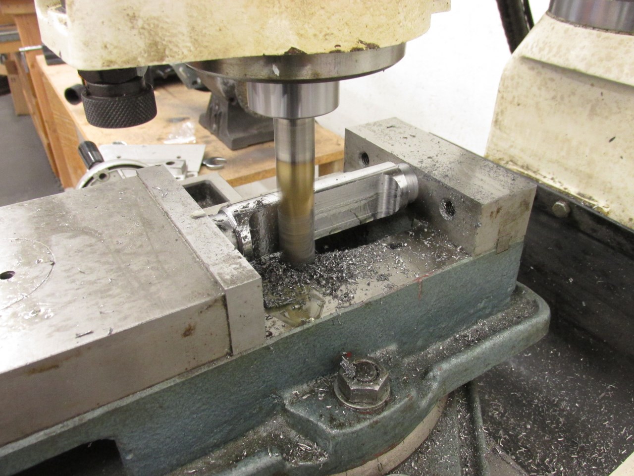 Machining control arm tube ends on mill