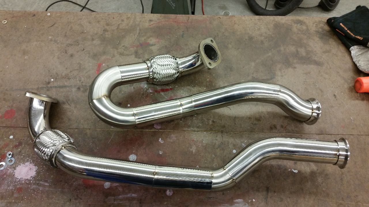 Dual exhaust pipes tack welded.